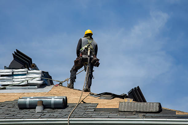Professional Roofing technician working in Libertyville, IA
